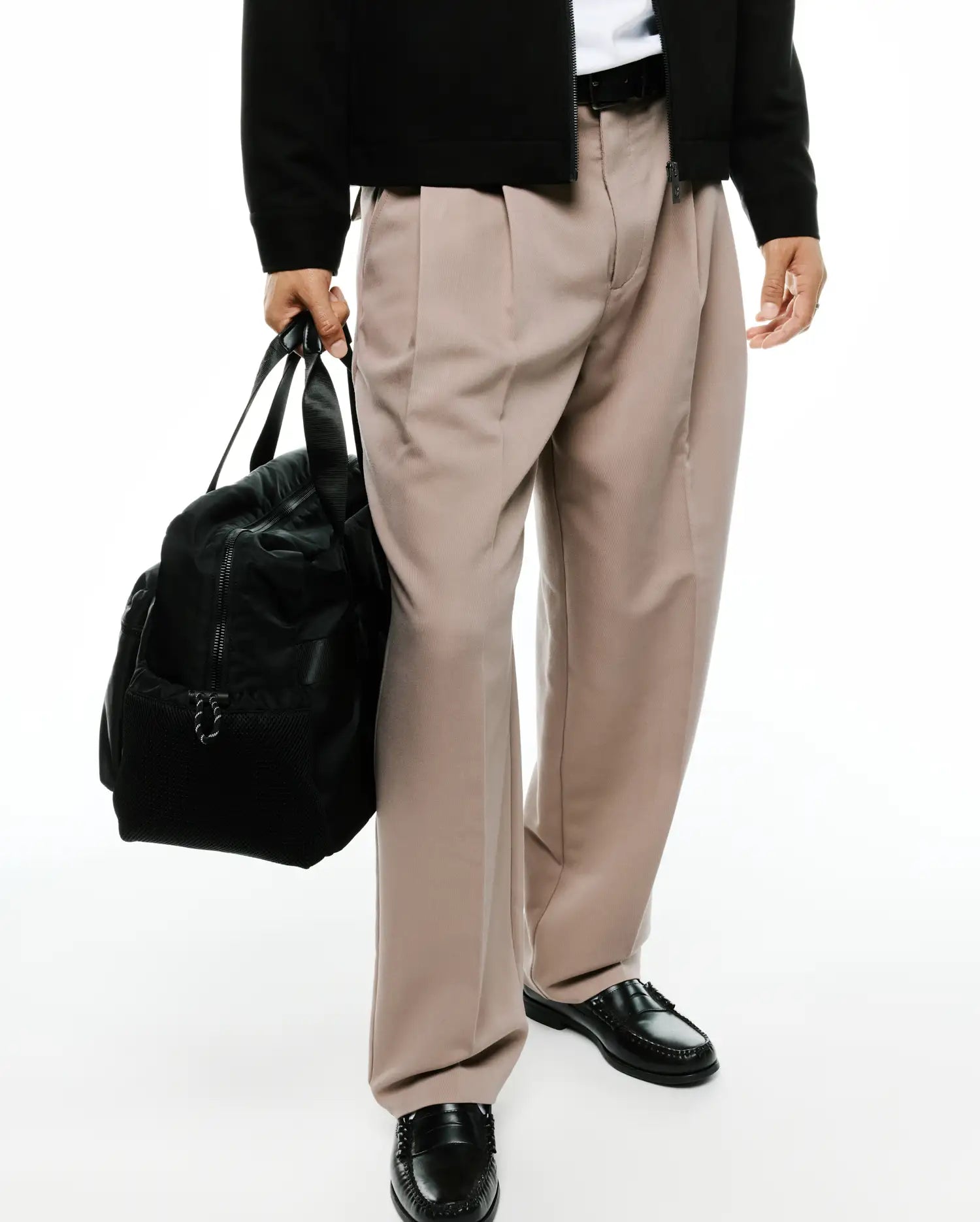 Men's Wayde Wide-Leg Pleated Pants in a smooth light beige fabric, featuring a relaxed wide-leg fit and prominent front pleats for a stylish streetwear look. (4)