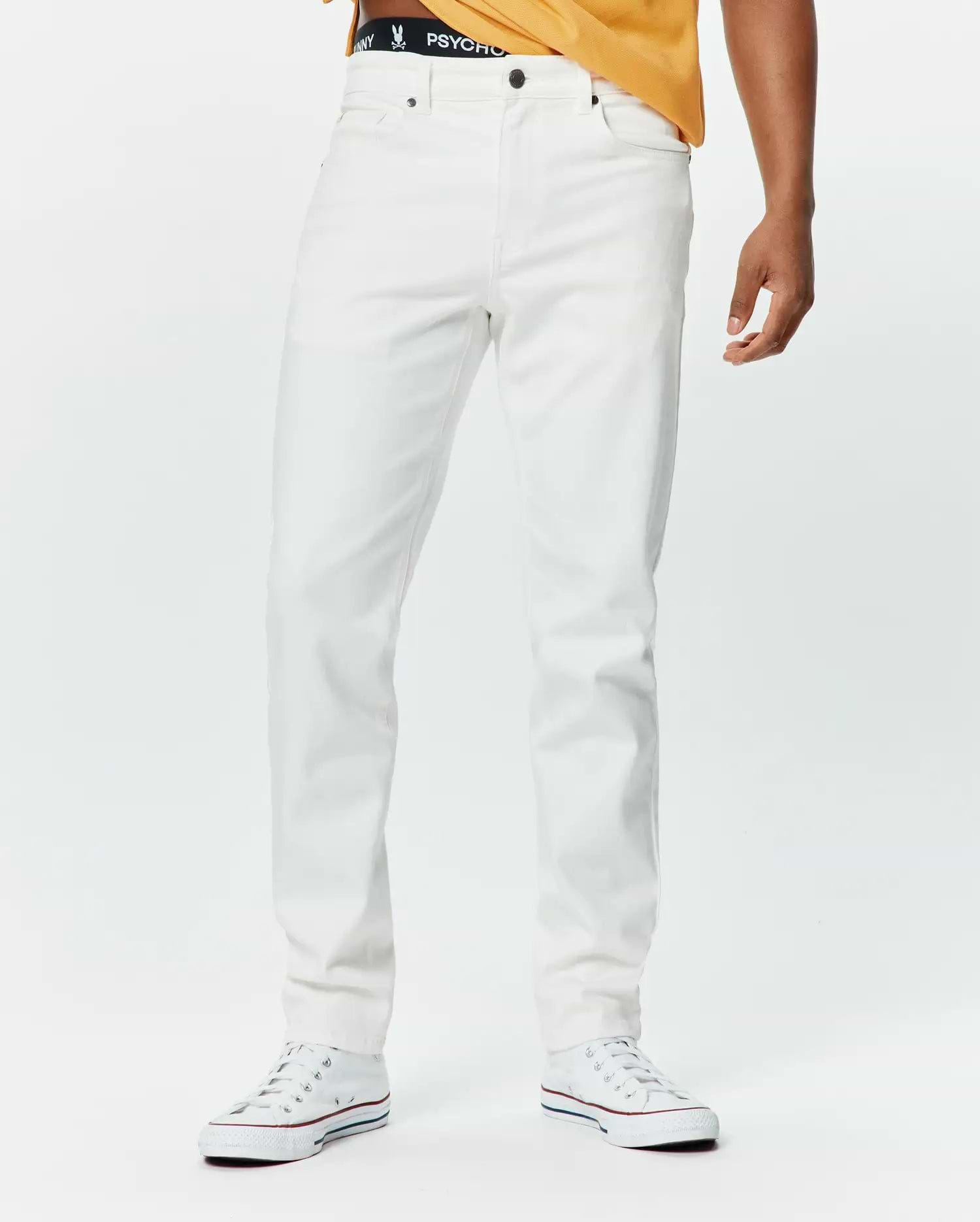 Mens Emerson Denim Pant, a premium classic fit white denim pant featuring a smooth texture, five-pocket styling, and dark button closure, embodying refined streetwear.