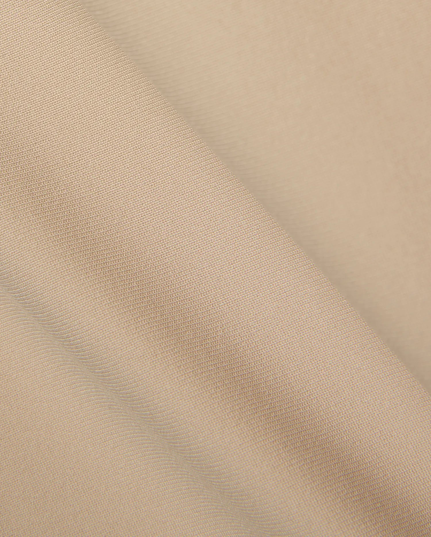 Mens Edward 10k Tapered Pant, a premium beige pant crafted from a finely woven, durable fabric with a subtle, tight diagonal texture, embodying refined streetwear style.