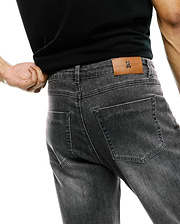 Mens Emerson Denim Pant in washed black, featuring a classic fit, faded denim texture, and a brown leather back waistband patch with an embossed Psycho Bunny logo.