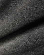 Mens Emerson Denim Pant featuring a dark charcoal grey denim fabric with a visible twill weave and subtle light flecks, creating a textured, washed appearance.