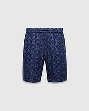 Mens Brad Linen Short 8 1/2, navy blue linen relaxed fit shorts with an all-over lighter blue pattern of palm trees and Psycho Bunny skull logos within scalloped arches, featuring a drawstring waist.