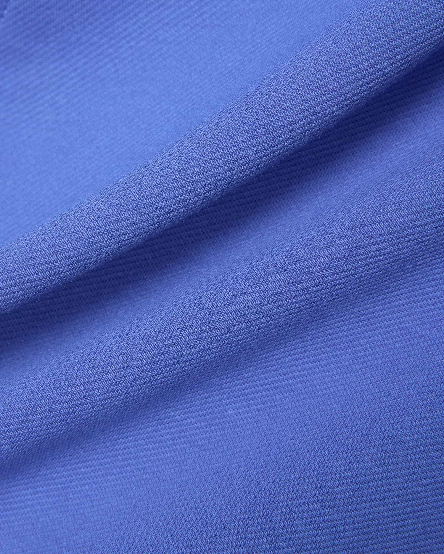 Mens Shiro Twill Short in a bold, rich periwinkle blue, showcasing the premium, finely woven twill fabric texture, embodying refined streetwear style.