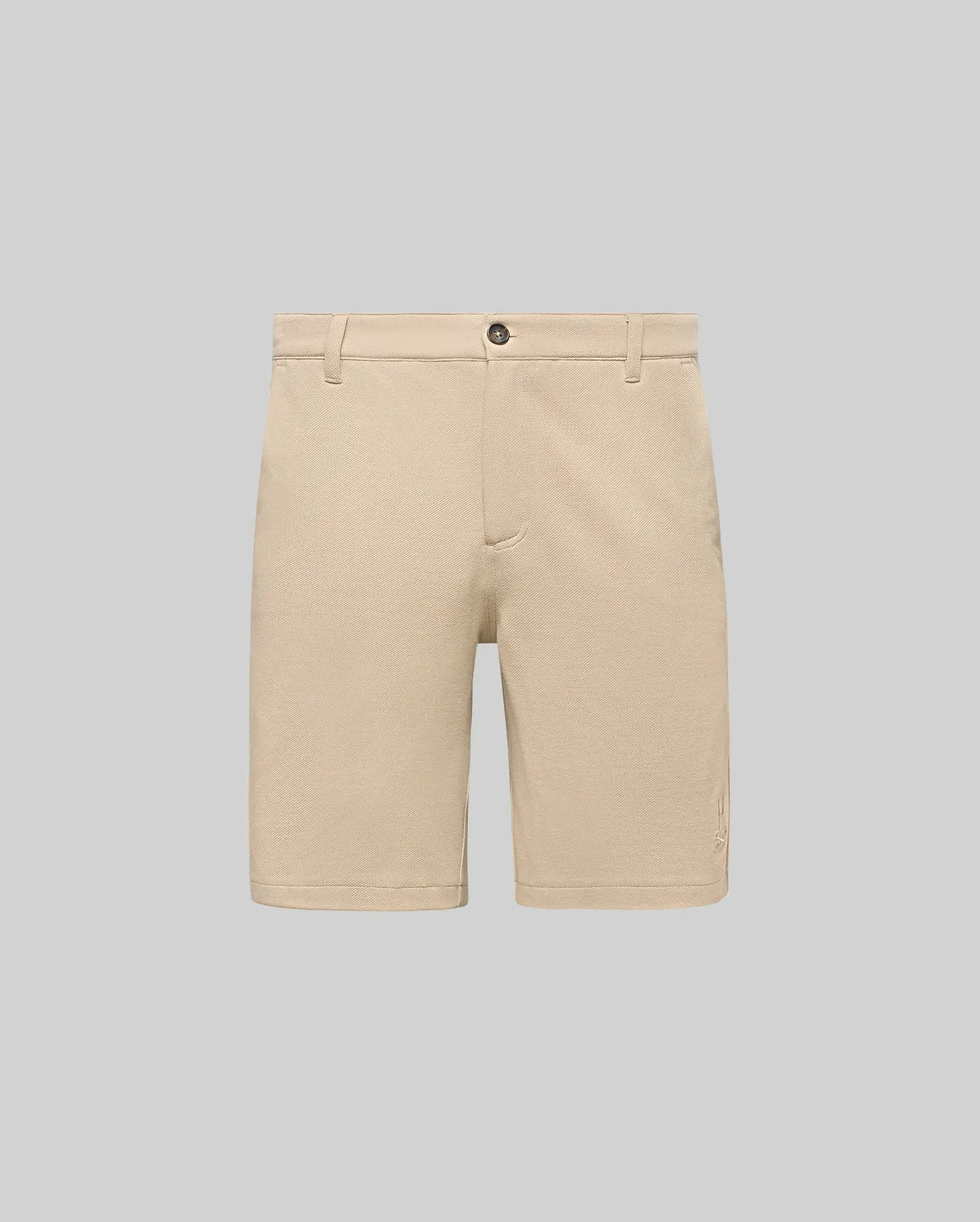 Mens Shiro Twill Short in beige, featuring a classic fit, visible twill texture, button closure, and a small embroidered Psycho Bunny skull logo on the lower left leg.