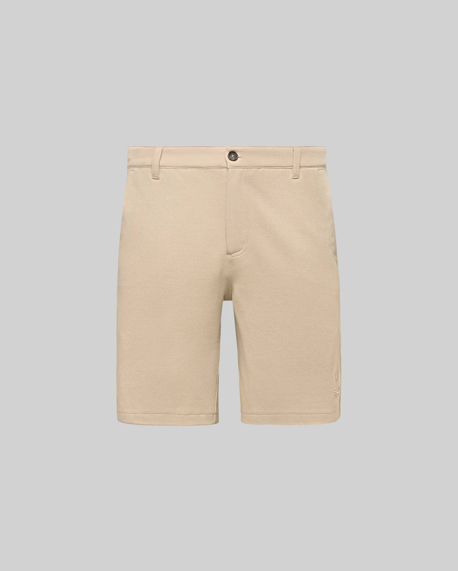 Mens Shiro Twill Short in beige, featuring a classic fit, visible twill texture, button closure, and a small embroidered Psycho Bunny skull logo on the lower left leg.