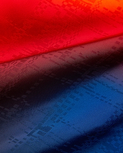 Mens Zander Jacquard Short in a striking red-to-deep-blue gradient, showcasing a refined, all-over tonal geometric jacquard pattern for a premium streetwear aesthetic.