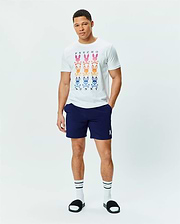 White jersey t-shirt with a large central graphic of nine gradient Psycho Bunny skull logos and PSYCHO BUNNY text, paired with navy Mens Blaze Sport Short with a small white embroidered Psycho Bunny logo on the left leg.