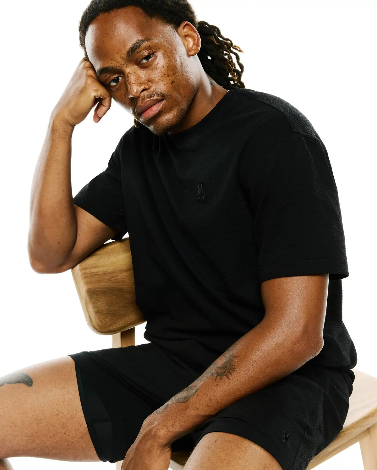 Black seersucker t-shirt, relaxed fit, with an embroidered bunny skull logo on the left chest, and matching Black Mens Arlen Seersucker Short with a bunny skull on the left thigh.