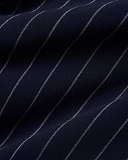 Mens Harland Double Weave Chalk Stripe Track Pant in deep navy blue, featuring fine, textured white chalk stripes woven into the fabric, highlighting its premium double weave texture. (6)
