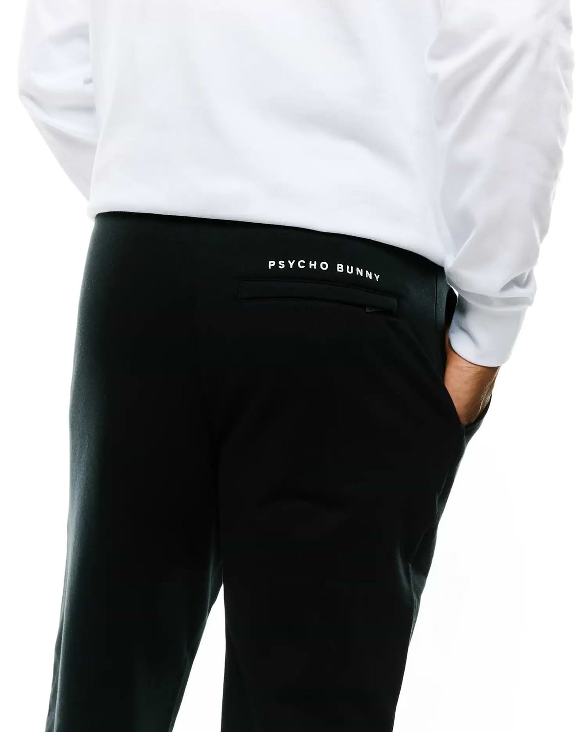 Mens Nathaniel Sweatpant, black relaxed fit French terry, featuring a small white embroidered Psycho Bunny text logo above the back right pocket.