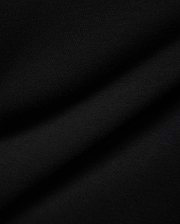 Mens Nathaniel Sweatpant in rich black, showcasing its luxurious, soft French terry knit fabric with a subtle diagonal texture and elegant drape, embodying premium streetwear style.