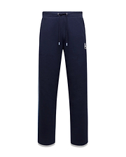 Mens Jaydon Track Pant, navy French terry with a relaxed fit, featuring a white drawstring waist, vertical blue and green side stripe, and a small embroidered white Psycho Bunny skull logo on the right thigh. (5)
