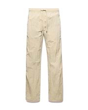 Mens Alder Nylon Pant in light beige with a crinkled nylon texture, featuring a relaxed straight-leg fit and an elasticated drawstring waist.