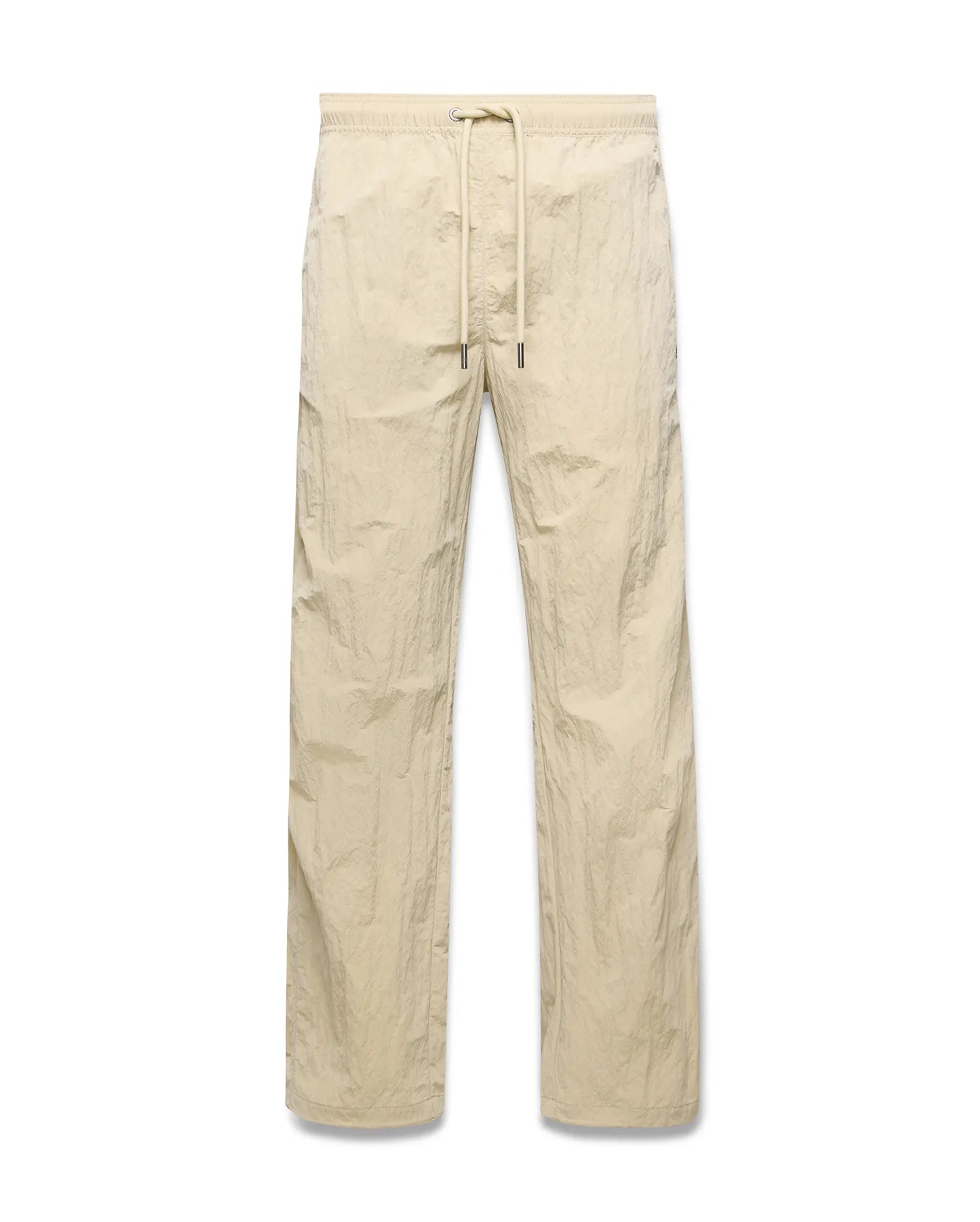 Mens Alder Nylon Pant in light beige with a crinkled nylon texture, featuring a relaxed straight-leg fit and an elasticated drawstring waist.