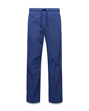 Mens Alder Nylon Pant in deep blue, featuring a relaxed straight leg fit, crinkled nylon fabric, and an elasticated drawstring waist with metallic tips. (5)