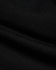 Black Mens Terrence Brushed Fleece Sweatpant fabric, showcasing the soft, luxurious texture of premium brushed fleece material with subtle, comfortable folds, ideal for refined streetwear.