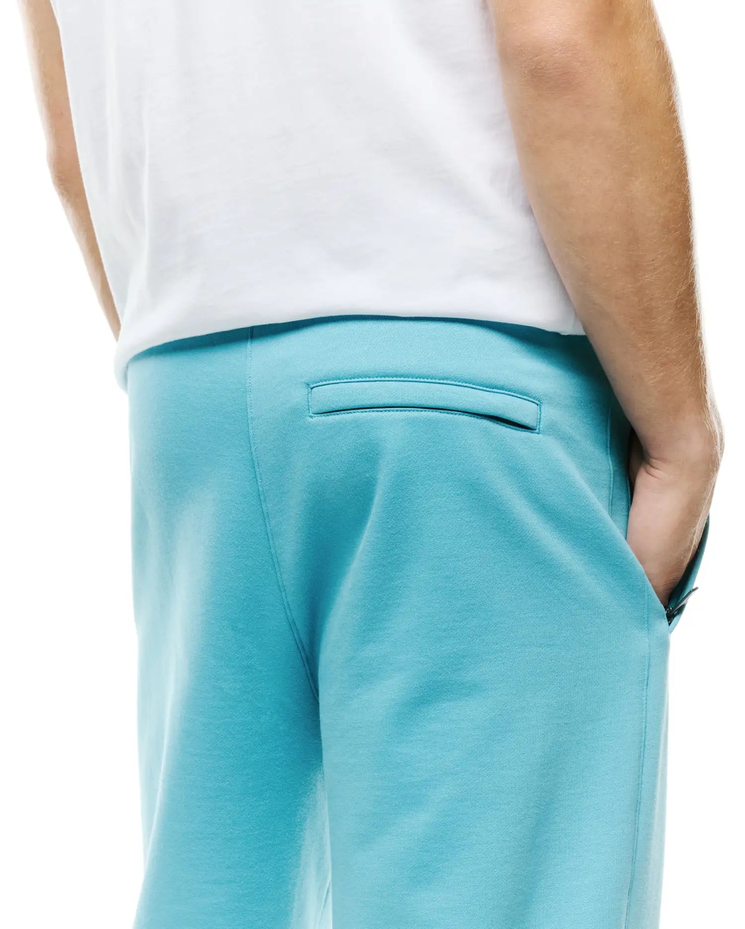 Mens Terrence Brushed Fleece Jogger in vibrant aqua blue, featuring a relaxed fit, soft brushed fleece texture, a back welt pocket, and a side pocket with a subtle zipper pull. (3)