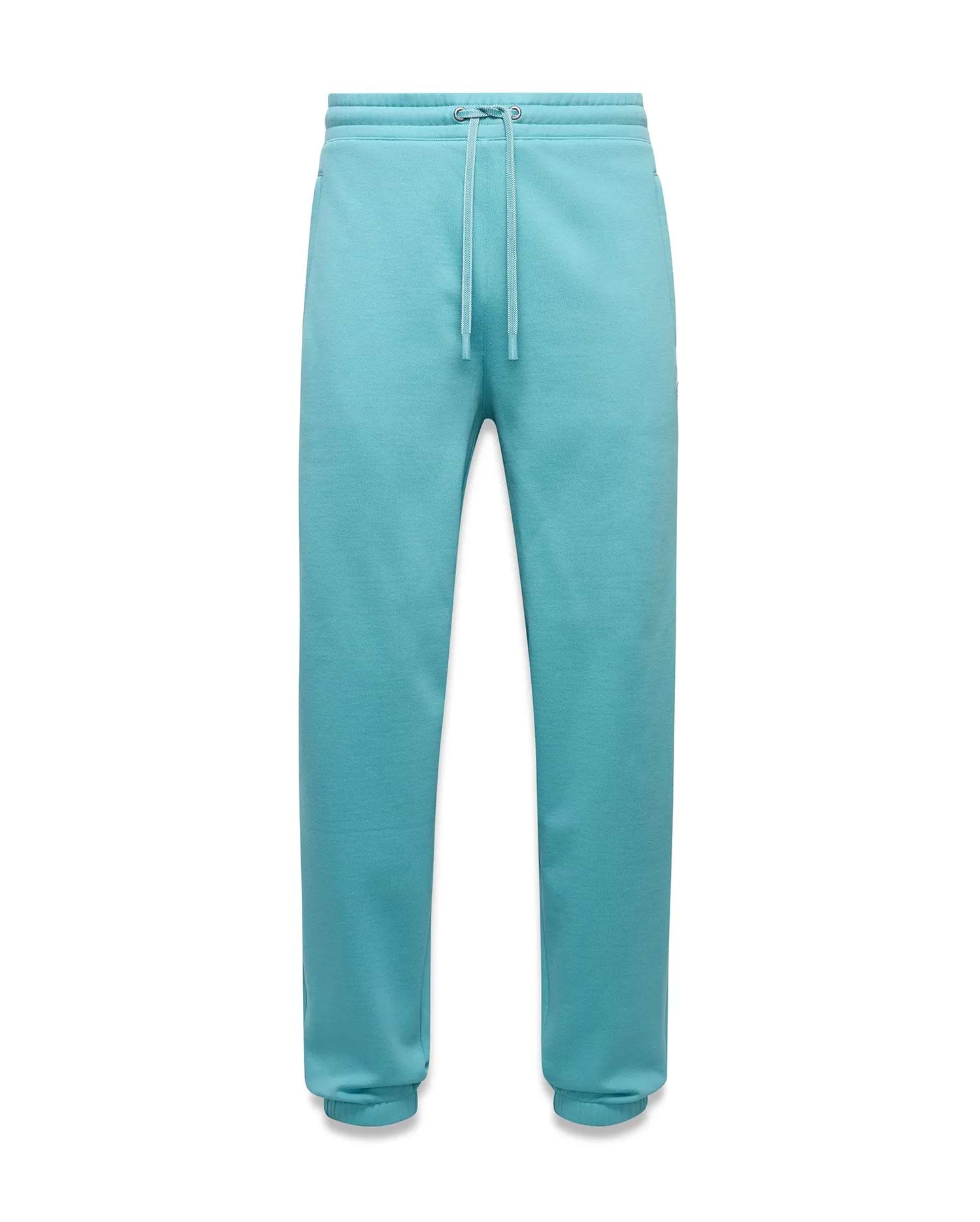 Mens Terrence Brushed Fleece Jogger in vibrant aqua, featuring a relaxed fit, drawstring waist, ribbed cuffs, and a small embroidered Psycho Bunny skull logo on the left thigh. (5)