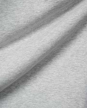 Mens Terrence Brushed Fleece Sweatpant, featuring a soft, light grey heathered brushed fleece fabric with a subtle knit texture and gentle folds.