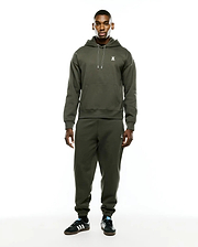 Olive green relaxed fit brushed fleece hoodie with white drawstring and embroidered Psycho Bunny skull chest logo. Paired with Mens Terrence Brushed Fleece Sweatpant, featuring an embroidered bunny skull thigh logo.
