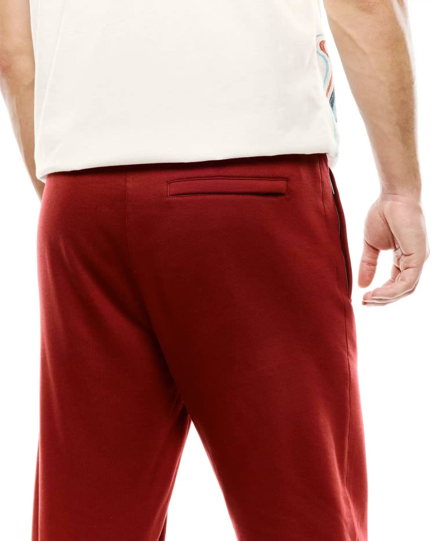 Mens Terrence Brushed Fleece Jogger in deep red, featuring a relaxed fit, soft brushed fleece texture, rear welt pocket, and subtle side seam zipper pocket. (3)