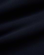 Rich, deep navy blue Pique fabric for the premium MEN'S JACQUES PIQUE TRACK PANTS, featuring a distinct, textured weave indicative of refined streetwear quality. (6)