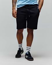 Black Mens Barry Short in relaxed fit french terry, featuring a drawstring waist, side pockets, a tonal embroidered bunny skull logo on the left leg, and a blue Psycho Bunny tag.