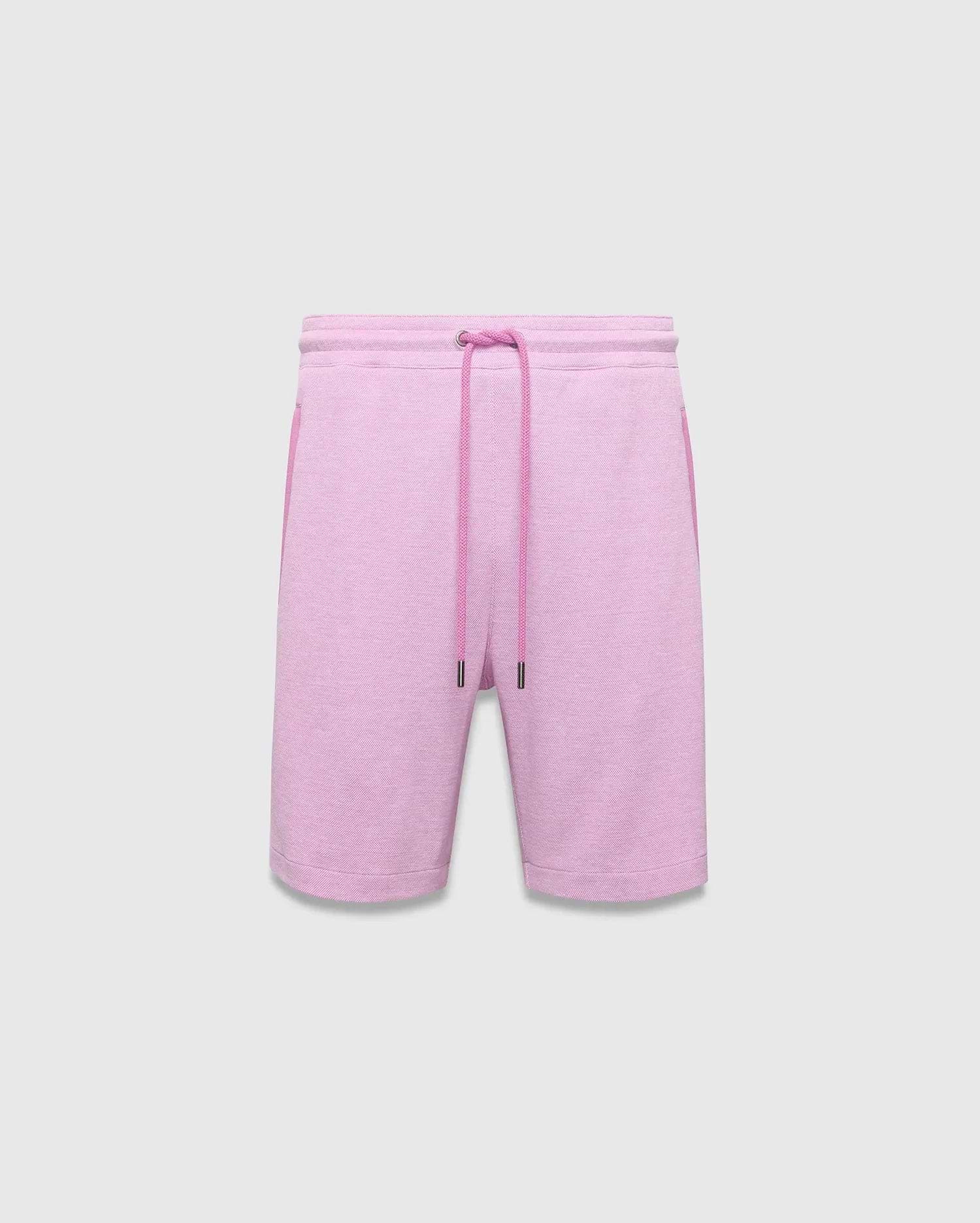 Mens Keith Short 8, a relaxed fit heathered light pink French terry short with an elastic drawstring waist, contrasting solid pink drawcords, and practical side pockets.