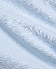 Mens Keith Short 8, showcasing a close-up of its premium light blue pique knit fabric, featuring a subtle, breathable texture, embodying Psycho Bunny's refined streetwear aesthetic.