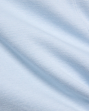 Mens Keith Short 8, showcasing a close-up of its premium light blue pique knit fabric, featuring a subtle, breathable texture, embodying Psycho Bunny's refined streetwear aesthetic.