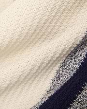 Mens Giles Knit Short 7, a premium cream textured knit short with prominent horizontal stripes in deep navy and a lighter marled blue, showcasing refined streetwear style.