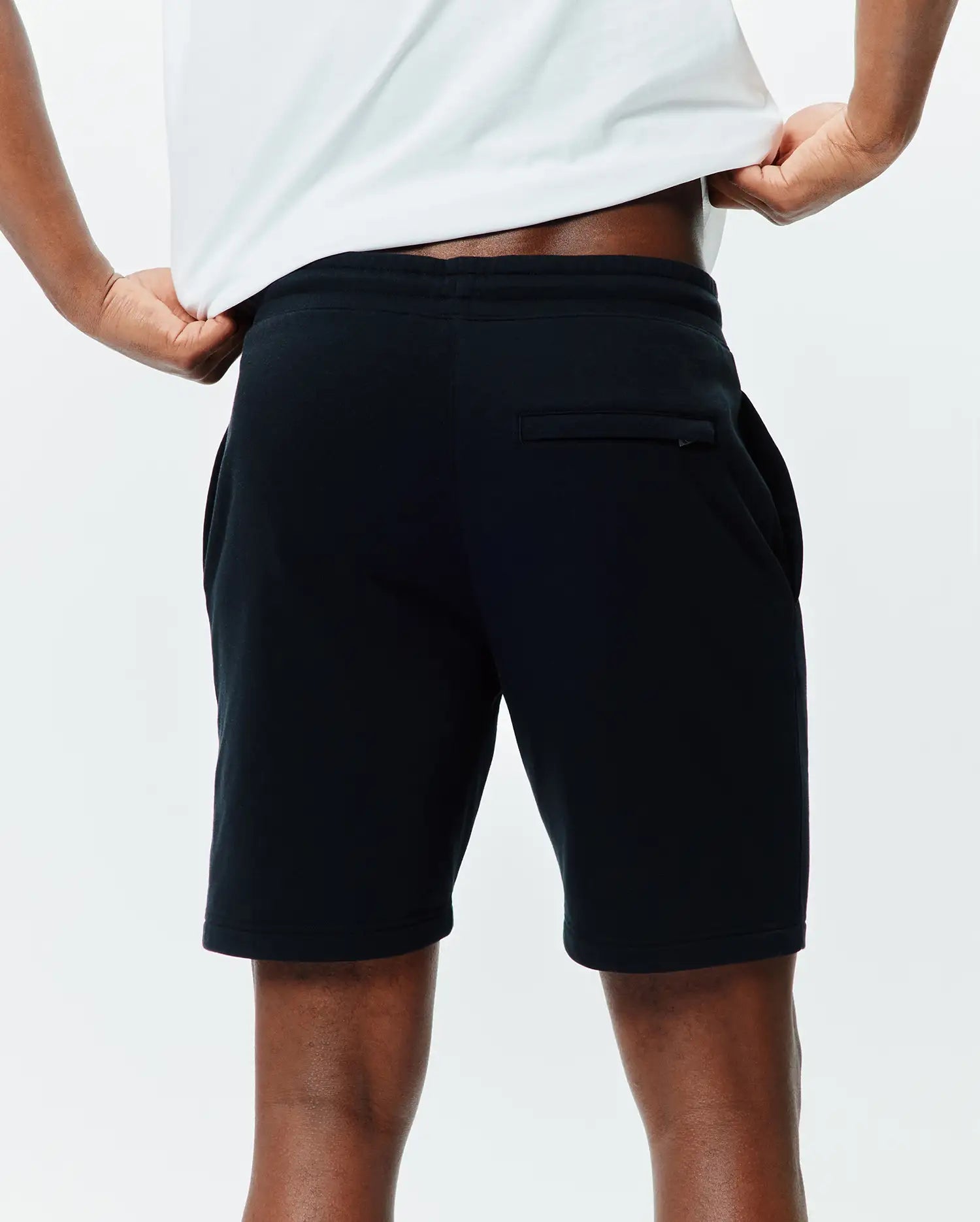 Mens Isaac Print Short, premium black relaxed-fit jersey shorts featuring a comfortable elastic waistband, practical side pockets, and a subtle rear welt pocket.