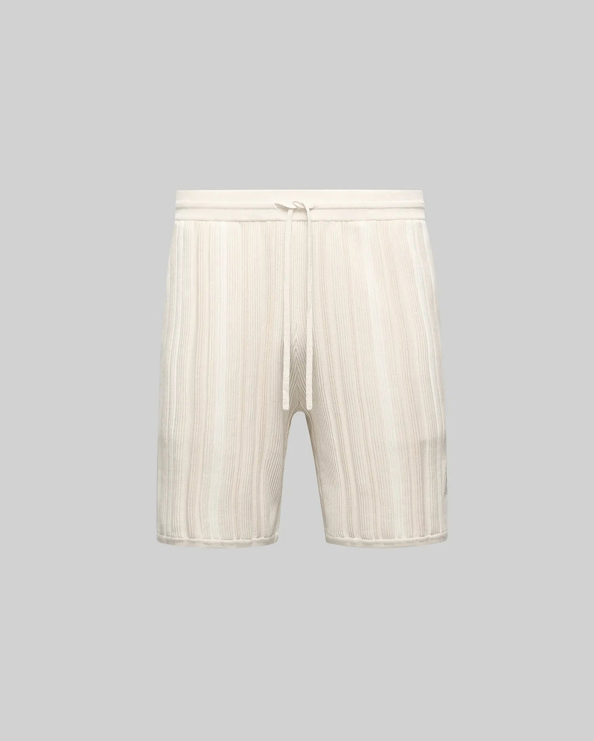 Mens Cliff Knit Short in cream, featuring a relaxed fit, vertical ribbed knit texture, and a drawstring waist. No visible Psycho Bunny logo.