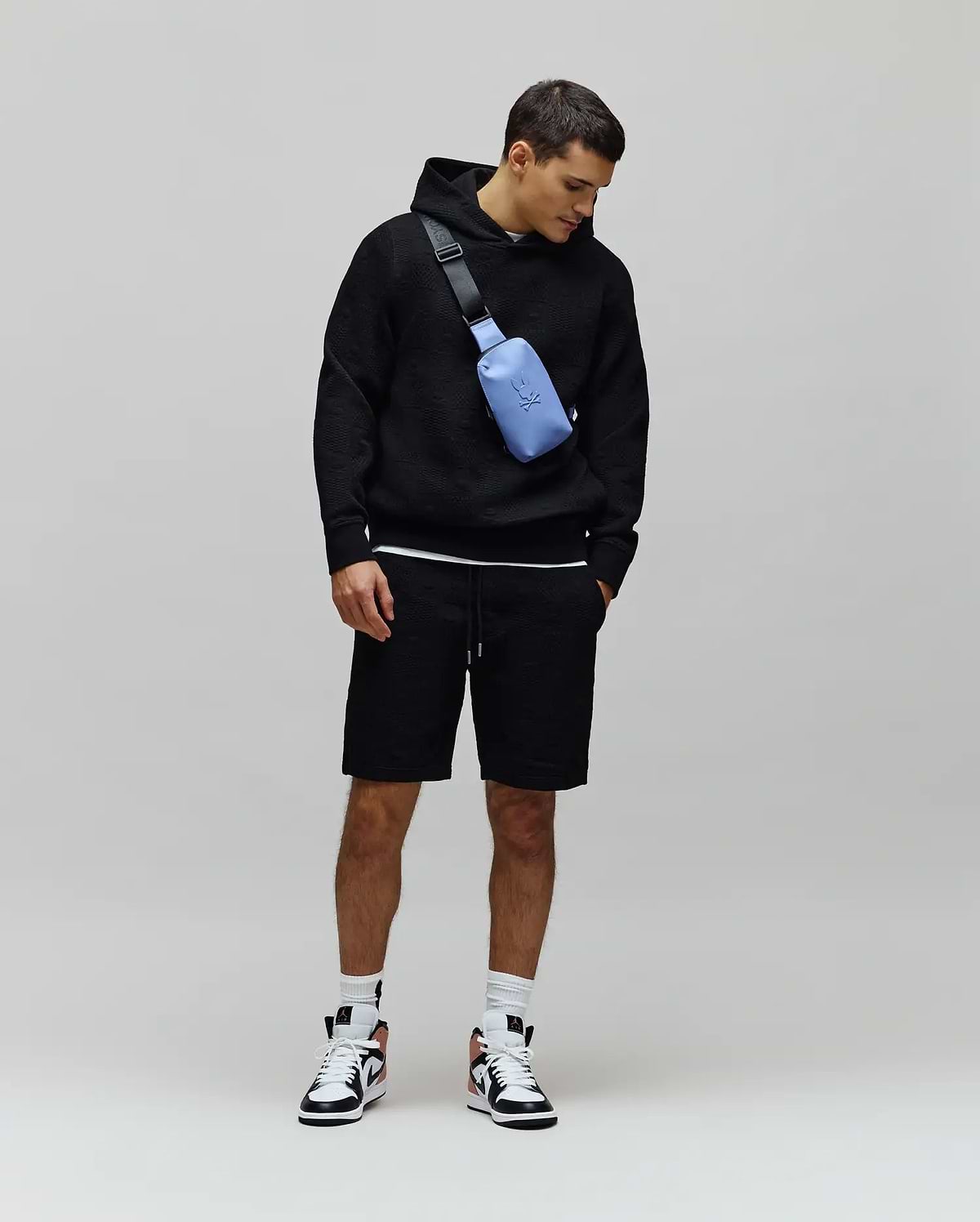 Black relaxed fit textured jacquard hoodie and matching Mens Dustin Sweatshort with drawstring waist, embodying refined streetwear.