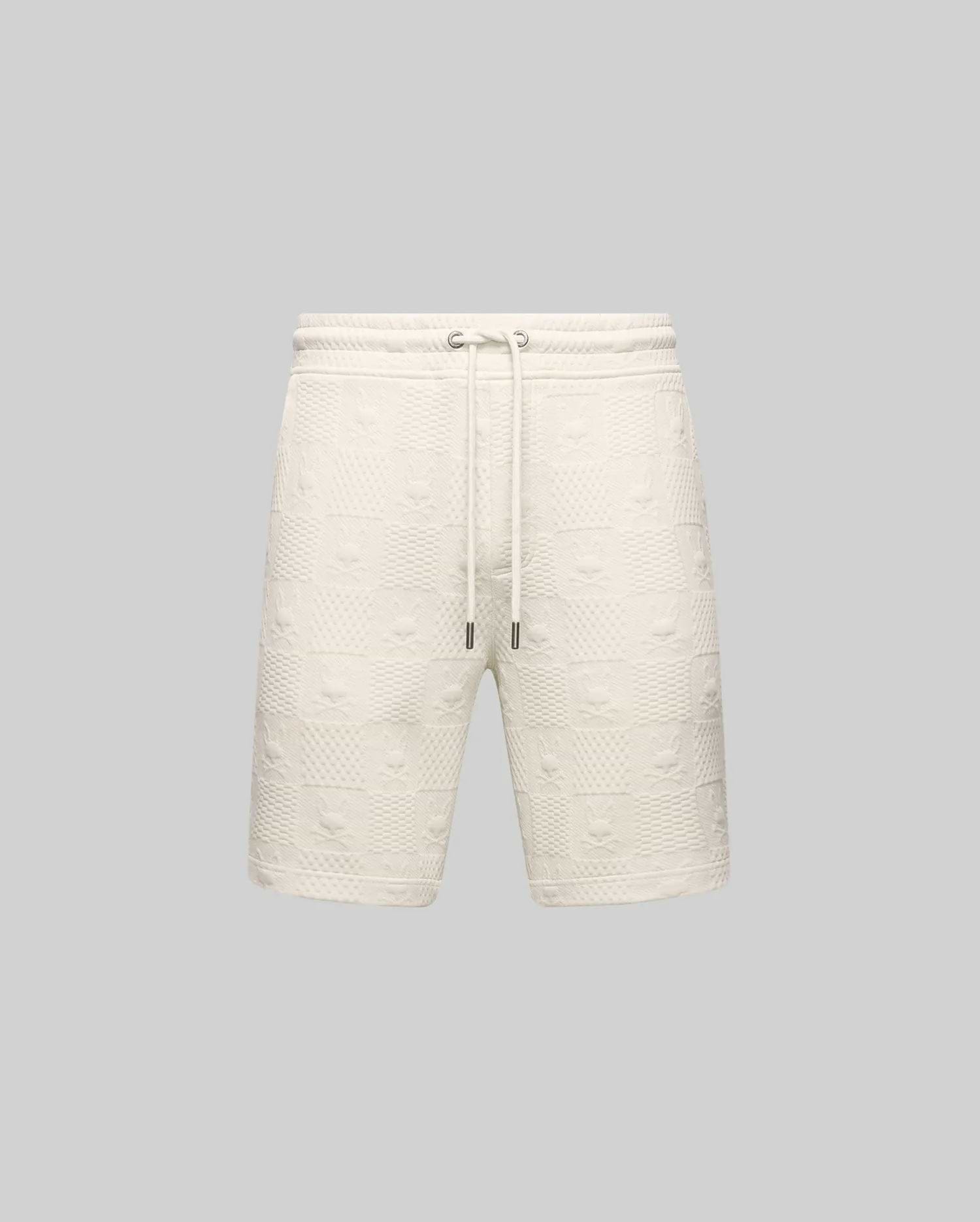 Mens Dustin Sweatshort, cream, featuring a relaxed fit and an all-over embossed checkerboard pattern with alternating Psycho Bunny skull logos and textured squares, complete with a drawstring waist.