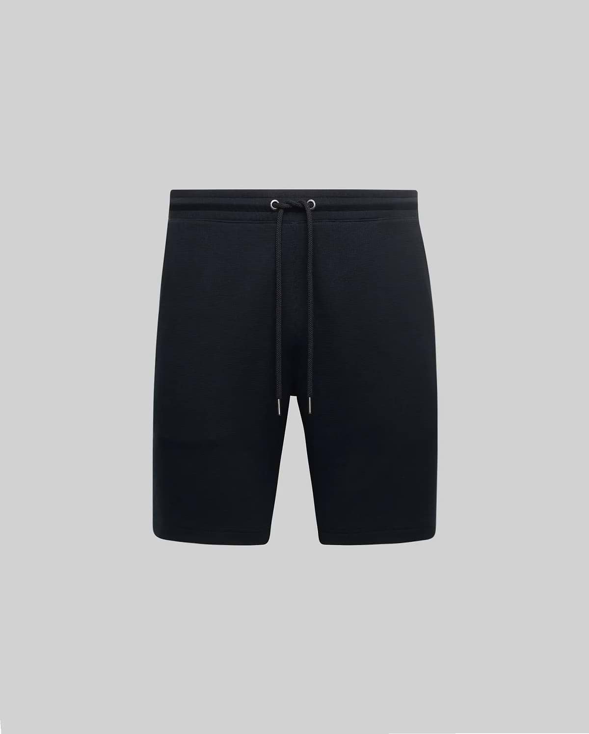 Black Mens Maxton Waffle Sweatshort with a relaxed fit, featuring a textured waffle knit fabric and an adjustable drawstring waist with metal eyelets.