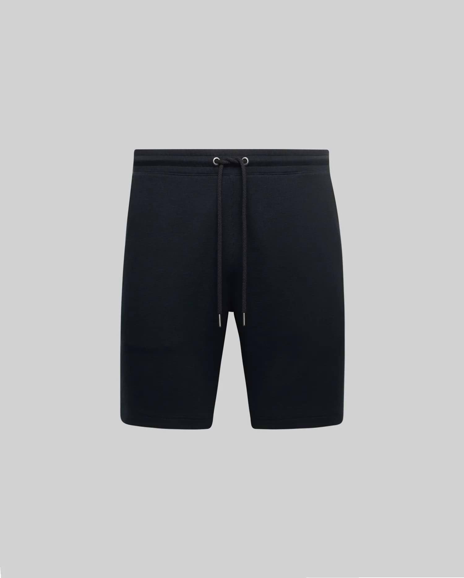 Black Mens Maxton Waffle Sweatshort with a relaxed fit, featuring a textured waffle knit fabric and an adjustable drawstring waist with metal eyelets.