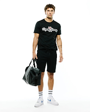 Black classic fit jersey t-shirt with large white Psycho Bunny script and red-eared bunny skull chest logo, paired with relaxed fit black Mens Marc Textured Short with drawstring waist.
