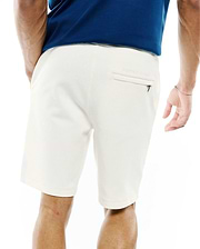 Cream Mens Marc Textured Short with a relaxed fit, featuring a textured pique fabric, a zippered back pocket, and an embroidered Psycho Bunny text logo.