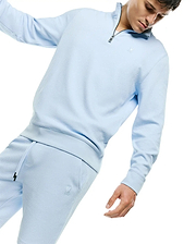 Light blue waffle knit quarter-zip sweatshirt featuring a tonal embroidered Psycho Bunny skull logo on the chest, paired with matching Mens Marc Textured Short with a tonal bunny skull logo on the left thigh.
