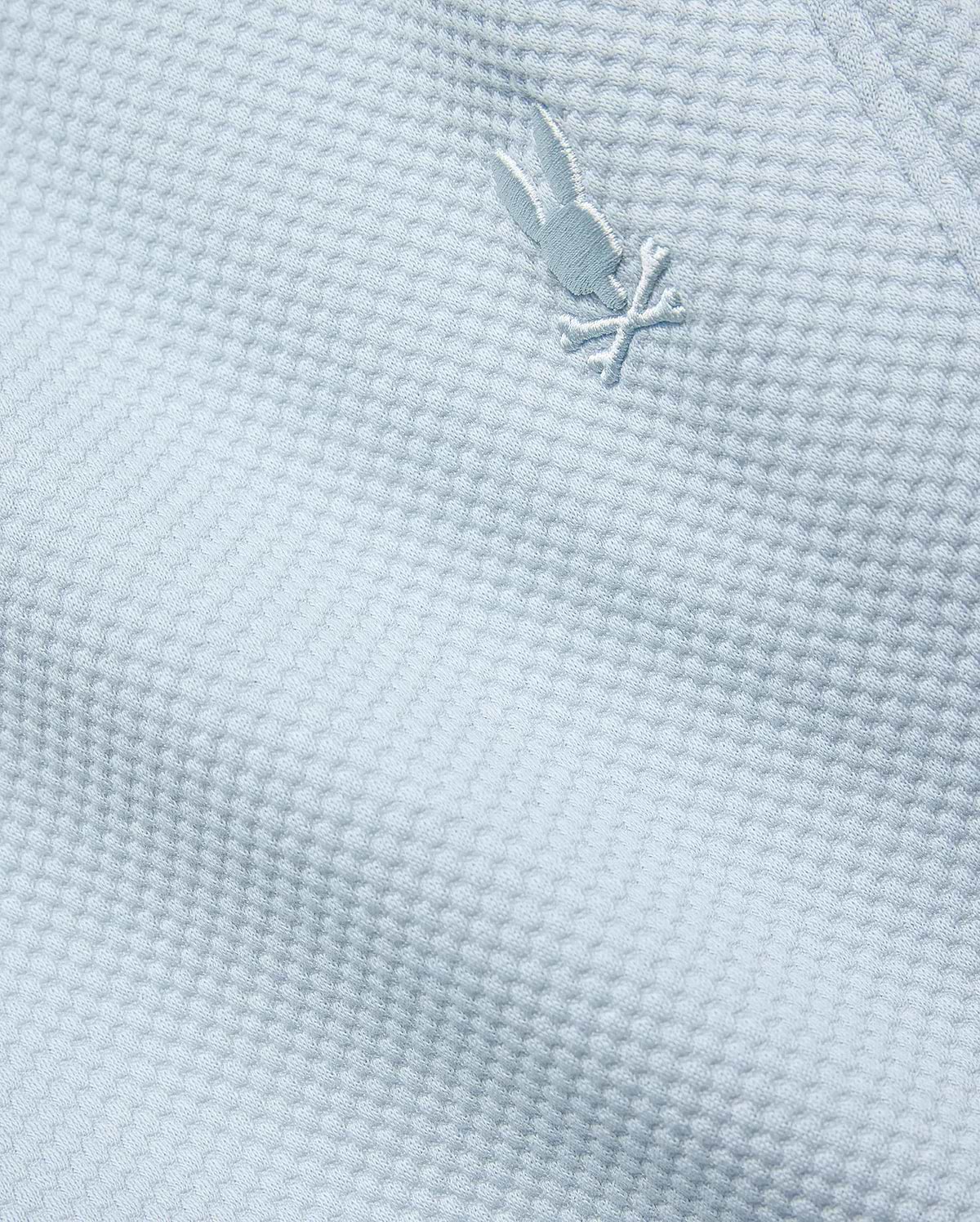 Mens Marc Textured Short in light blue, featuring a premium textured knit fabric and a small, iconic tone-on-tone embroidered Psycho Bunny skull logo.