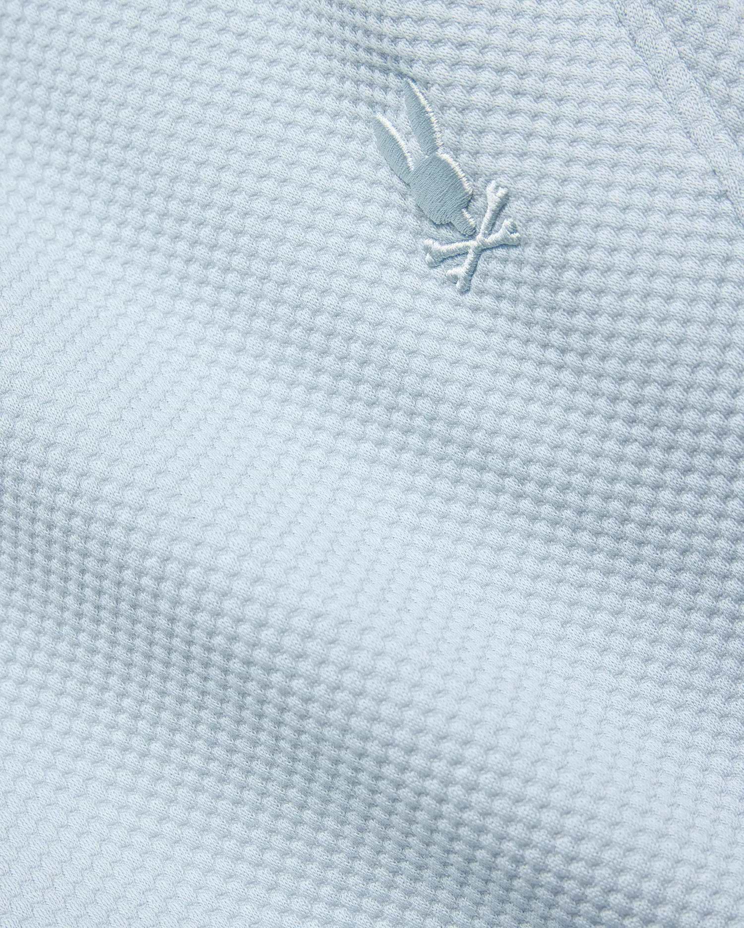 Mens Marc Textured Short in light blue, featuring a premium textured knit fabric and a small, iconic tone-on-tone embroidered Psycho Bunny skull logo.