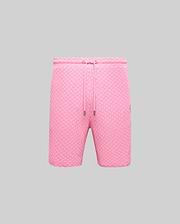 Mens Garen Knit Short in vibrant pink, featuring a unique woven checkerboard texture, relaxed fit, drawstring waist with silver tips, and a small embroidered Psycho Bunny skull logo on the right thigh. (4)