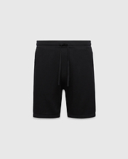 Black MENS DEVON KNIT SHORT with a relaxed fit, featuring a textured knit fabric, ribbed waistband, and drawstring closure. No visible Psycho Bunny logo.