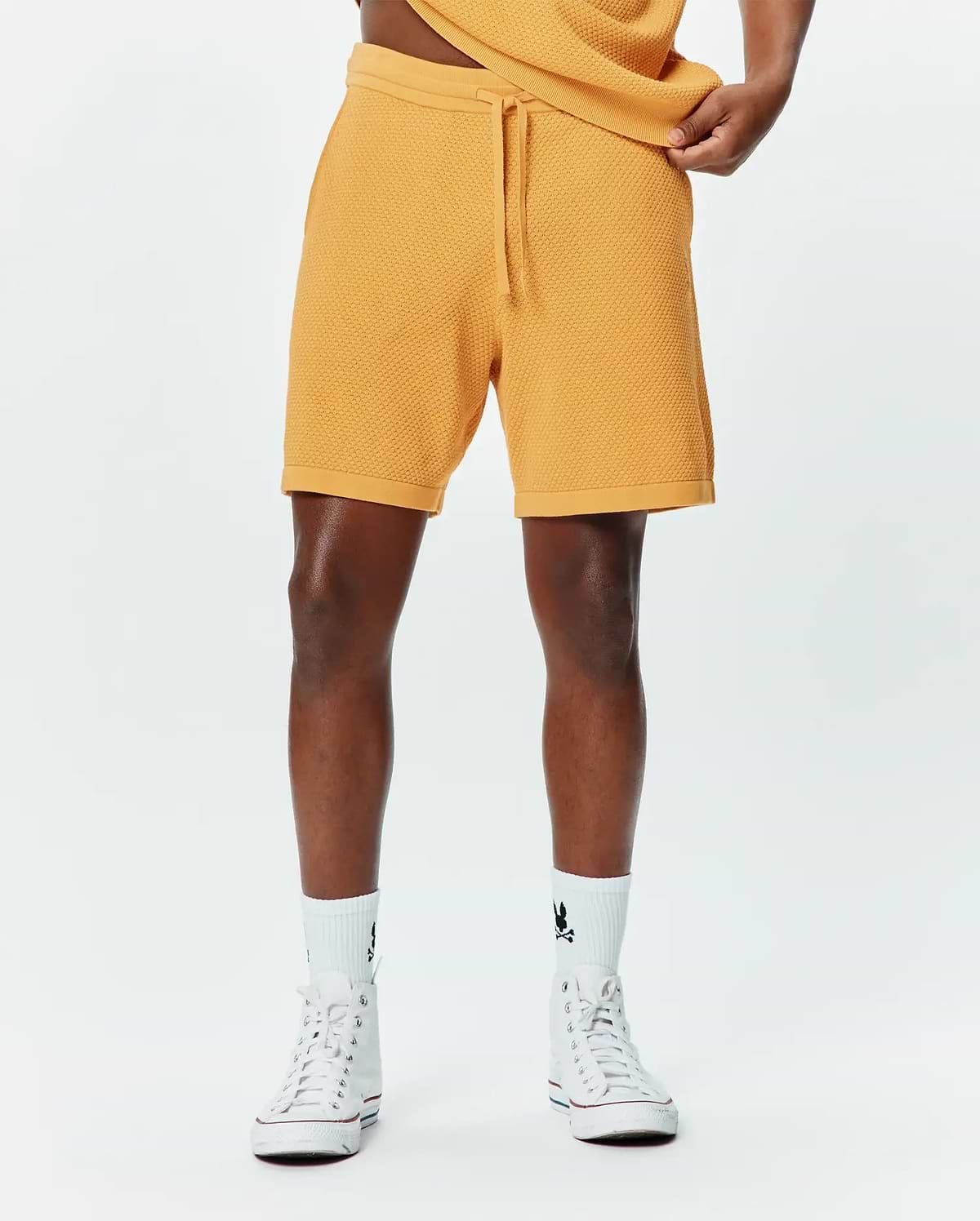 Mens Devon Knit Short, a premium golden yellow textured knit short with a relaxed fit, featuring a comfortable drawstring waist and ribbed hem, embodying refined streetwear style.