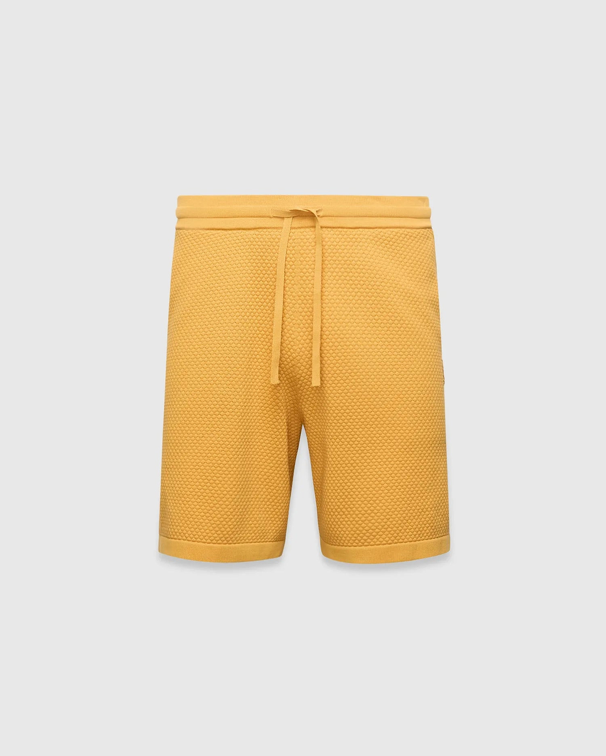 Mustard yellow Mens Devon Knit Short, a relaxed fit, premium textured waffle knit short with an adjustable drawstring waist and ribbed hem.