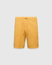 Mustard yellow Mens Devon Knit Short, a relaxed fit, premium textured waffle knit short with an adjustable drawstring waist and ribbed hem.