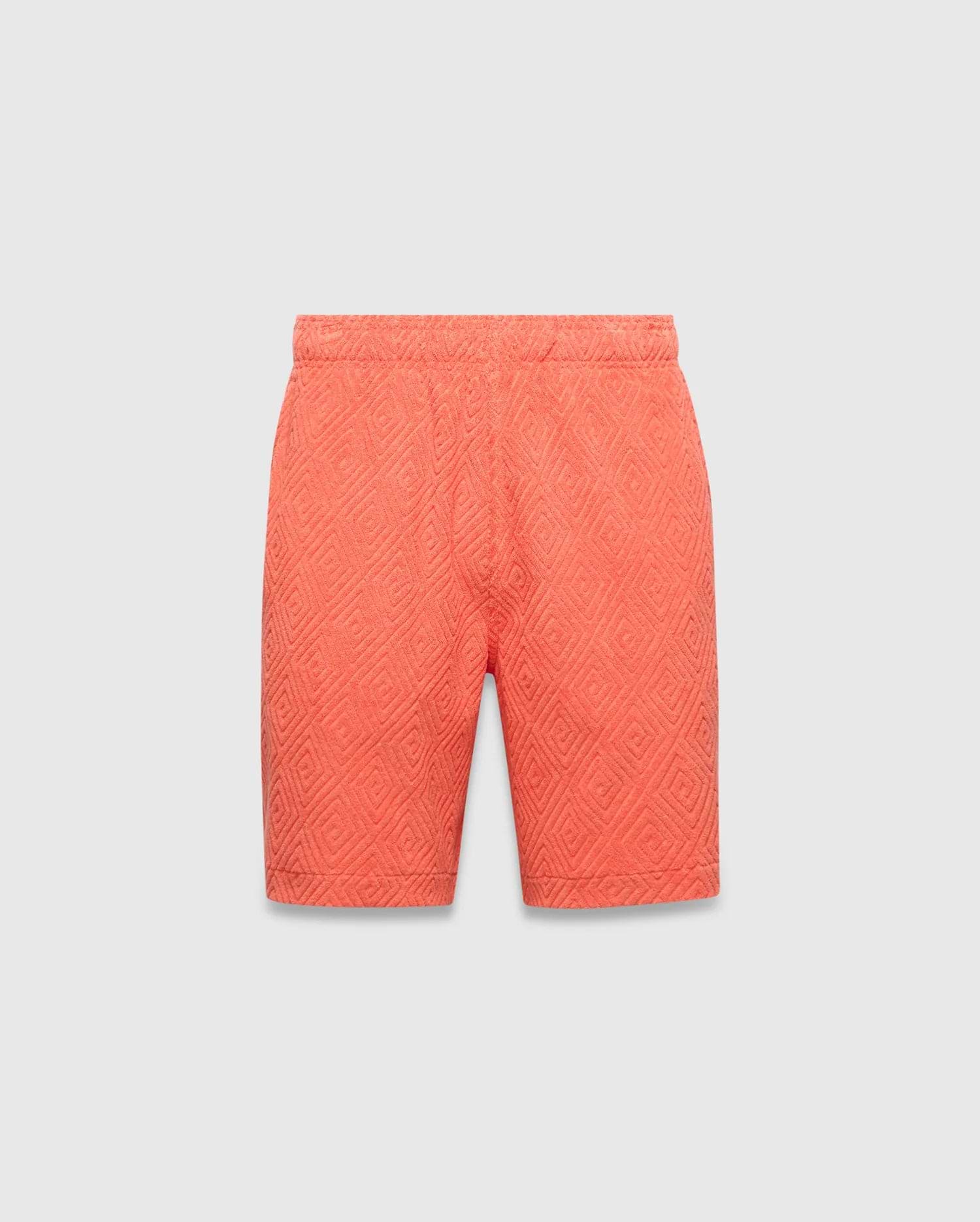 Mens Tristan Short, vibrant coral relaxed-fit shorts featuring an all-over raised diamond jacquard pattern and comfortable elastic waistband, embodying Psycho Bunny's refined streetwear. (5)