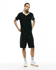 Black polo shirt and MENS GARRY JACQUARD SWEATSHORT set featuring a subtle all-over Psycho Bunny skull jacquard pattern, white V-neck collar, and white striped cuffs. Classic fit. (2)