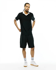Black polo shirt and MENS GARRY JACQUARD SWEATSHORT set featuring a subtle all-over Psycho Bunny skull jacquard pattern, white V-neck collar, and white striped cuffs. Classic fit. (2)